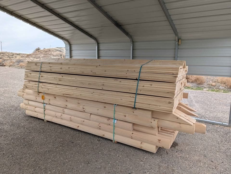 Bundle of pre-cut log cabin kit materials